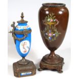 A 19thC cast metal and painted vase, of tapering circular form on compressed inverted circular