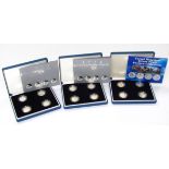 Various collectors' coins, comprising a 2004 United Kingdom silver pattern set and two others,
