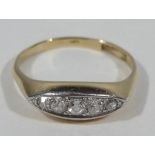 An 18ct gold gypsy ring, set with five diamonds, in bi-colour design, yellow metal, marked 18ct, 3.