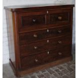 A Victorian mahogany chest, the D-end top raised above two short and three long drawers with diamond