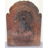 A 19thC cast iron fire back plate, decorated in relief as angel Gabriel, (AF), 81cm high and 60cm