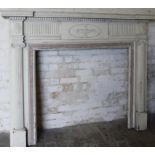 An 18thC style Adam revival neo-classical fire surround, in painted pine, the inverted outline