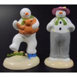 A Coalport Characters The Snowman figure, Dressing Up, 14cm high, first edition, and Dancing With