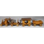 A 1960s scratch built wooden toy set, comprising train, with articulated wheels, 18cm high,