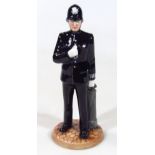 A Royal Doulton Classics figure A Policeman, HN4410, printed marks beneath, 25cm high.