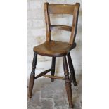 WITHDRAWN BY VENDOR PRE-SALE. A 19thC child's ash and elm chair, with double shaped horizontal