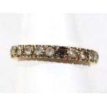 A 9ct gold eternity ring, set with white stones (AF one missing), 1.9g all in, boxed.