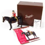 A Beswick Queen Elizabeth II and Burmese equestrian group, limited edition no. 158/500, with gold