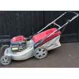 A Mountfield rotary mower with grass box, 50cm wide.