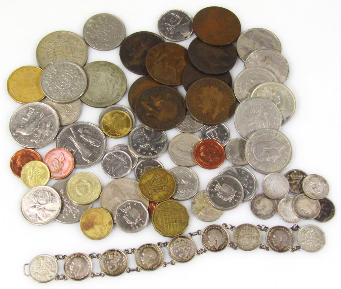 A quantity of decimal and pre-decimal coinage, to include half crowns, large ten pence coins and a