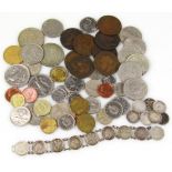 A quantity of decimal and pre-decimal coinage, to include half crowns, large ten pence coins and a