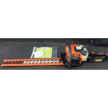 A Stihl petrol hedge trimmer, 119cm wide.