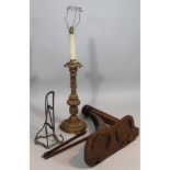 A 19thC gilt wood candlestick, with a floral dish holder, inverted stem, leafy base on scroll feet