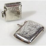 A Victorian silver vesta case, of square outline, with rounded ends, match strike base, partially