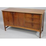 A 1960's retro Vanson teak sideboard, with double cupboard and three draws, 76cm high, 136cm wide,