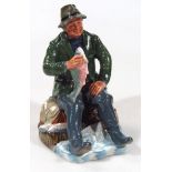 A Royal Doulton figure A Good Catch, HN2258, printed marks beneath, 20cm high.