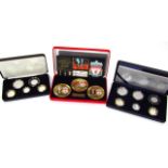Various coin sets, comprising a Liverpool FC Winners Of The Treble, limited edition set, of