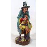 A Royal Doulton figure The Mask Seller, HN2103, printed marks beneath, 24cm high.