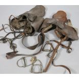 Various 20thC horse tack, leather saddles, stirrups, foot irons, etc. (a quantity, various