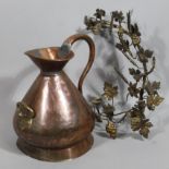 A late 19thC copper and brass harvest jug, of large proportion, with scroll handle, shaped body