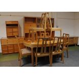 A retro teak dining room suite, comprising extending D-end table, (when closed) 76cm high, 146cm