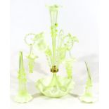 A vaseline green glass epergne centrepiece, with central trumpet raised with a circular