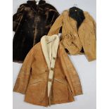 A gentleman's suede coat, quarter length with wool type inlay, a ladies suede coat and a fur