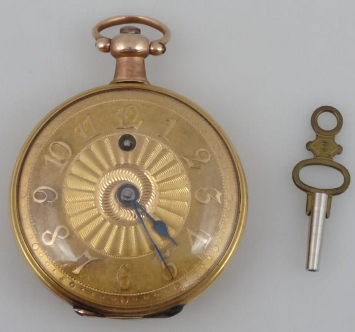 An 18ct gold open faced pocket watch, the fancy Arabic dial with gilt coloured back plate and