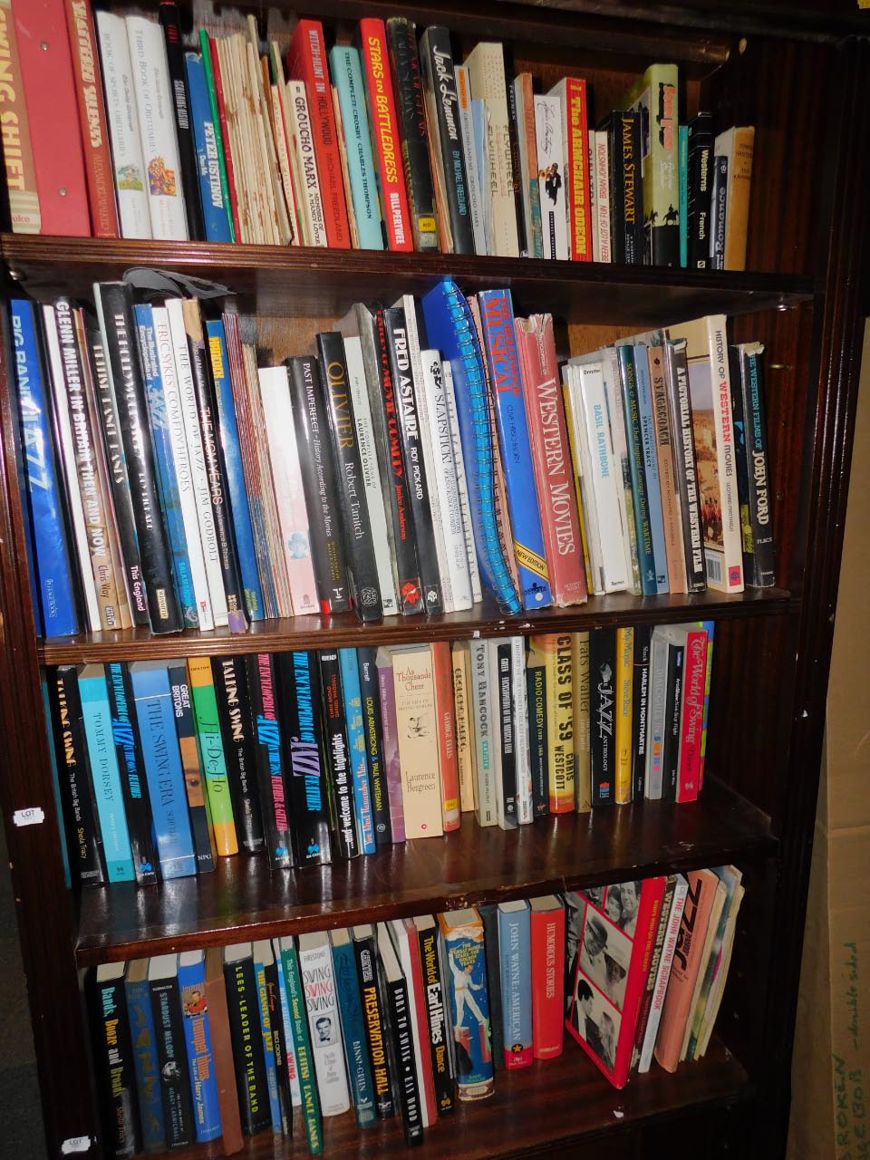 Books relating to film, jazz, comedy and other entertainment, (4 shelves).