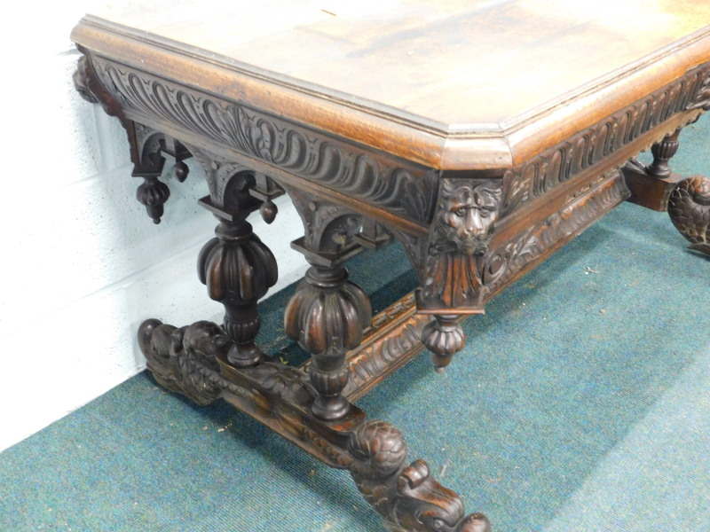 A Victorian carved oak side table, decorated with lion masks, raised on twin bulbous supports to - Image 3 of 6