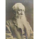 A 19thC photographic portrait, of an old gentleman with grey beard, in a heavy stained pine frame,