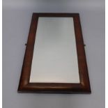 A Victorian rosewood rectangular cushion wall mirror, inset bevelled glass, 106cm x 61cm.