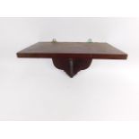 A mahogany wall bracket, 35cm x 22cm.