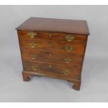 A George II mahogany chest of drawers, with four long graduated drawers, raised on bracket feet,