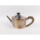 A George III silver teapot, probably by Thomas Chawner, the oblong body bright cut with garlands and