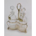 A Victorian Mappin Brothers plated three bottle wine cruet, wine three labels for Brandy, Gin and