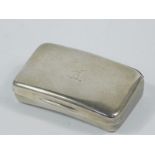 A George III silver snuff and silver gilt snuff box, the shaped oblong lid with Baines family crest,