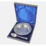 A George V silver christening set, by James Deakin & Sons, comprising circular dish, 16cm