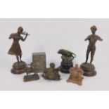 A pair of cast metal figures modelled as musicians, 24cm high, Elizabeth II copper Coronation