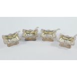 A set of four George III silver and silver gilt open salts, probably by Robert Gainsford, with