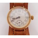 A Waltham gentleman's circular gold cased wristwatch, circular dial bearing Arabic numerals,