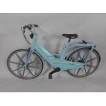 A Volvo Itera plastic bicycle, circa 1980's, blue frame.