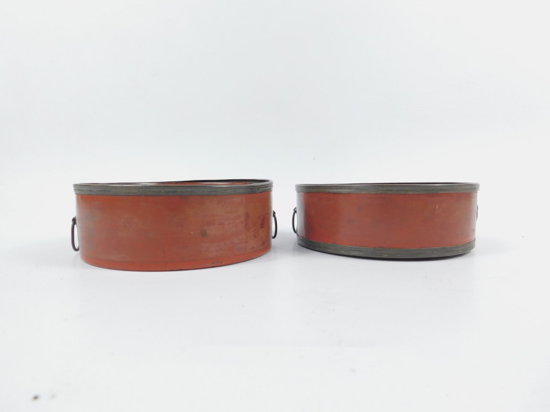 A pair of Georgian red lacquer decanter coasters, with brass fittings, 14cm diameter