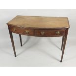 A 19thC mahogany bow fronted side table, with a crossbanded top, above two false frieze drawers