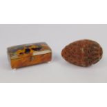 A carved Coquilla nut egg form box, 6.5cm long, and a tortoiseshell early 19thC snuff box, of