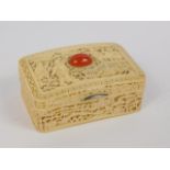 A Cantonese 19thC ivory box and hinged cover, of curvilinear rectangular form with pierced figural