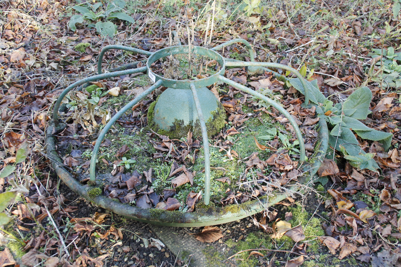 A cast iron Mexican hat animal feeder.