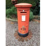 A red cast iron Edward VIII Post Office post box of pillar form. Viewing: Viewing is online only