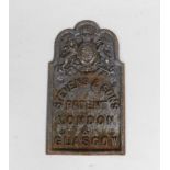 A Stevens & Sons Patent cast iron wall plaque, cast with a Royal Coat of Arms, London & Glasgow,