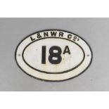 A LENWR Co 18A oval black and white cast iron sign, 30cm x 45cm.